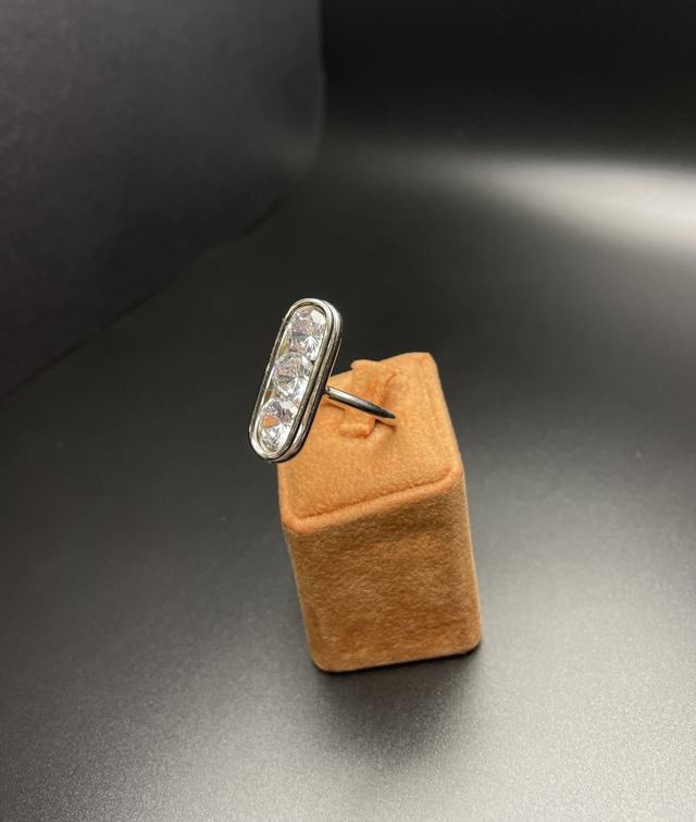 Eclissi Mobile – Anello in Argento 925 con Tre Zirconi Rotanti