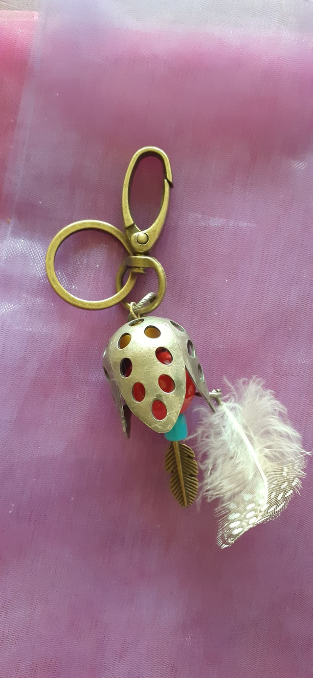 Gaela Porte-clés bronze antique, plume et perle céramique orange