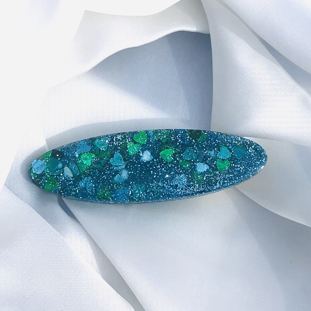 Jenny*pince  resine cœur paillettes