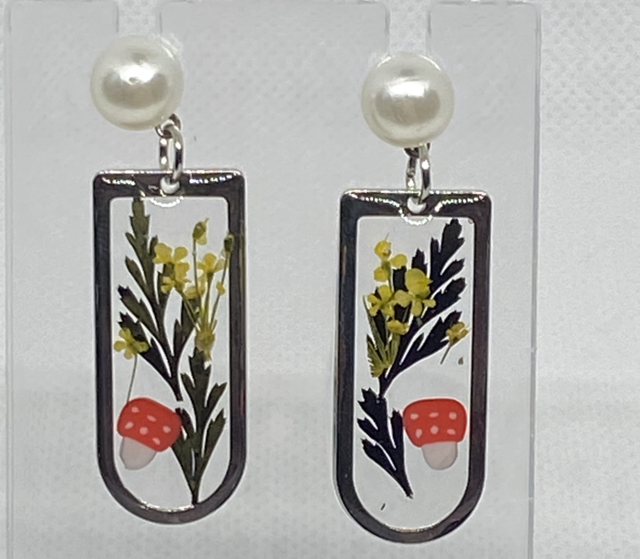 Silver flower and mushroom dangly earrings 
