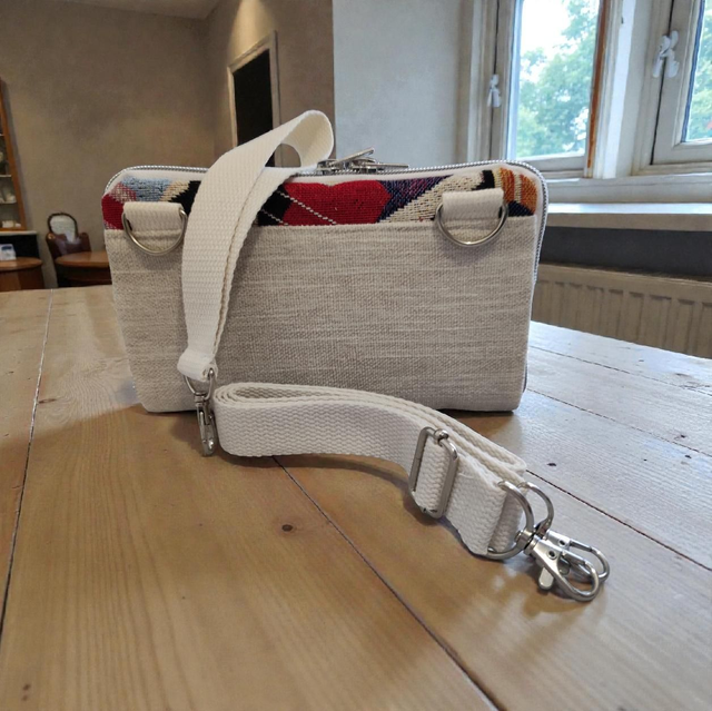 Pochette portefeuille bandoulière Jacky motifs jacquard 