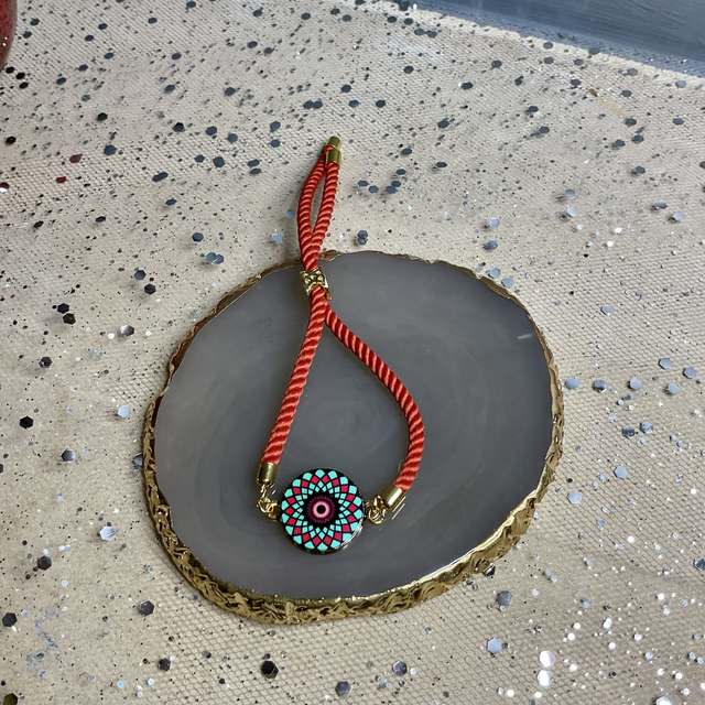 Handmade adjustable cord bracelets.