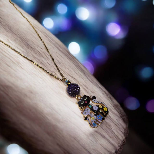 Collier acier inoxydable et cristal noir et violet chats