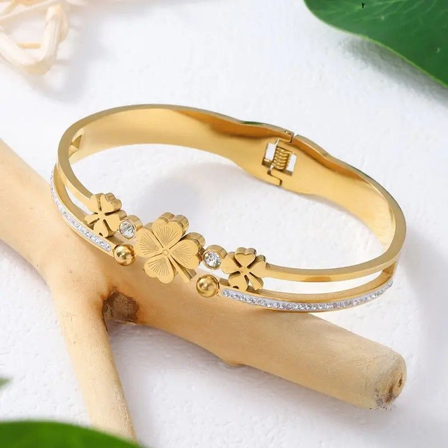 Bracelet doré fleur et strass élégant