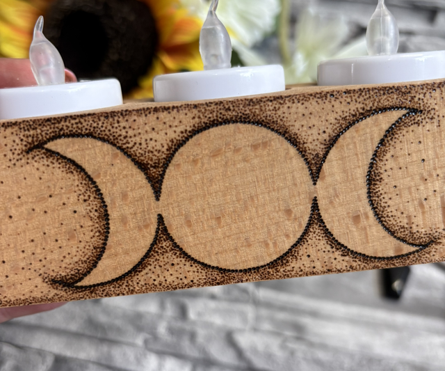 Triple moon tealight holder