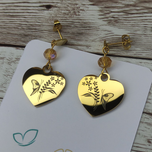 Boucles d&#039;oreilles &quot;Papillon et fleurs&quot; gravées 