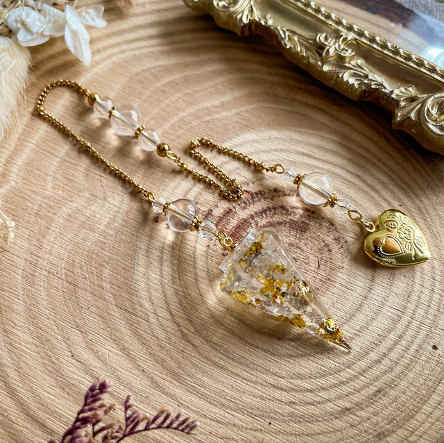 Pendule cristal de roche médaillon photo