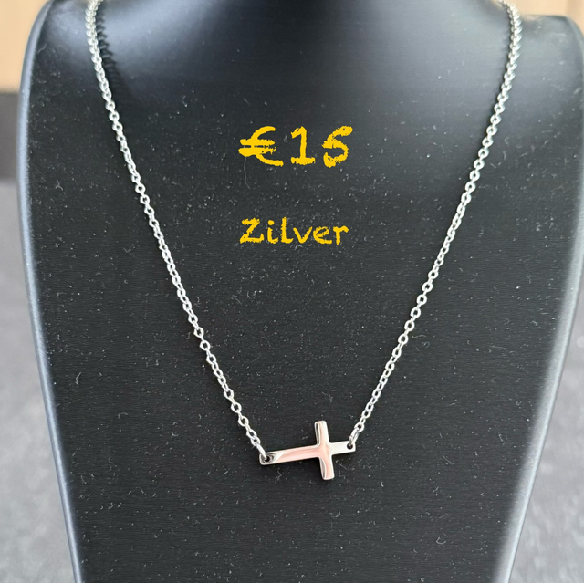 kruis zilver kleurig