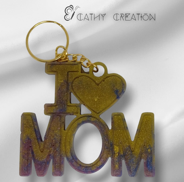 Porte clés doré et violet 