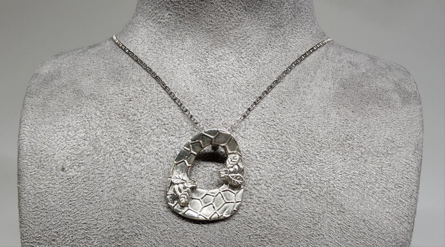 Two bee ring fine silver pendant