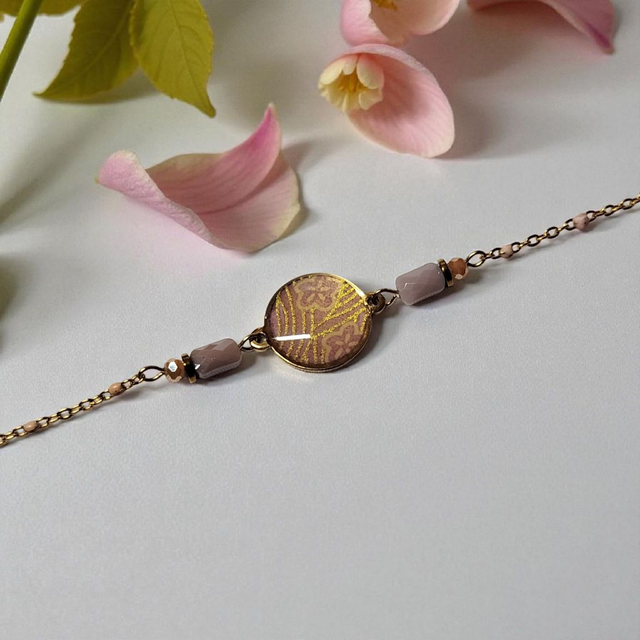 bracelet acier inoxydable motifs japonais rose clair et doré
