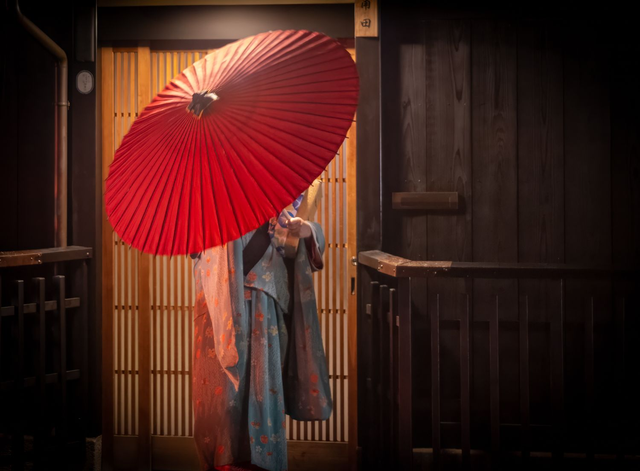 Concealed Grace: Geisha in Red