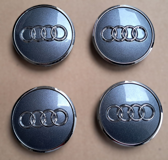 4 enjoliveurs cache moyeu jante Audi Occasion