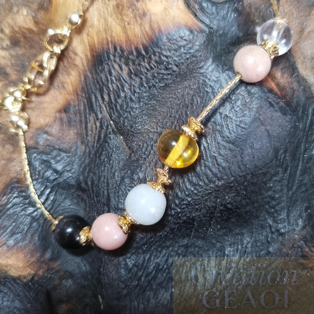 Bracelet des êtres chers (obsidienne noire, Opale Rose, emeraude, ambre,rhodocrosite, cristal de roche