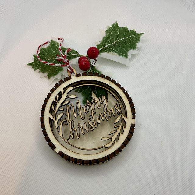 Laser cut Christmas ornament. Wooden design.