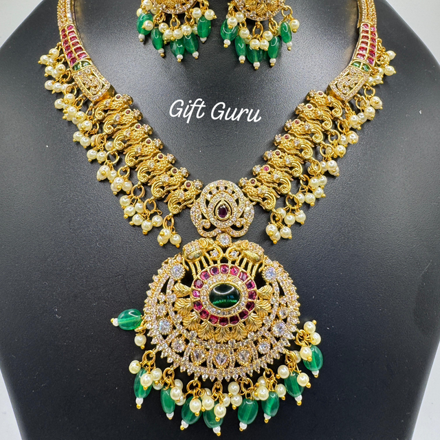 Temple necklace with ear rings 