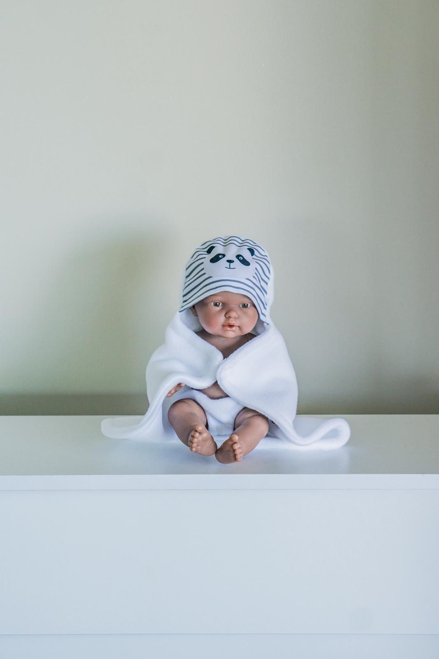 Poupée cape motif Panda