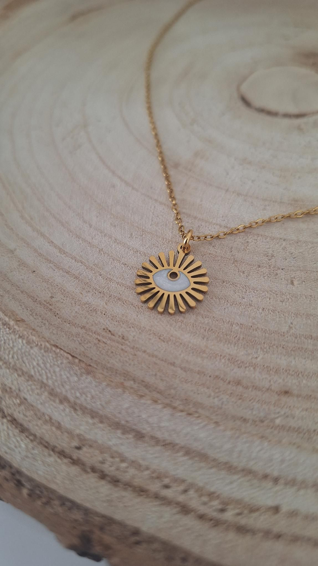 Collier doré soleil œil blanc