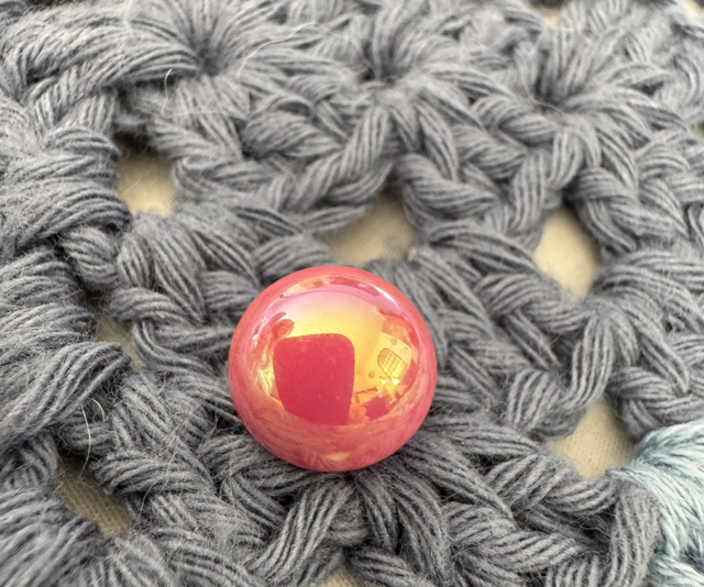 Pin’s bille rose