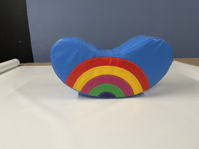 Light blue appliqué rainbow Jelly bean rocker