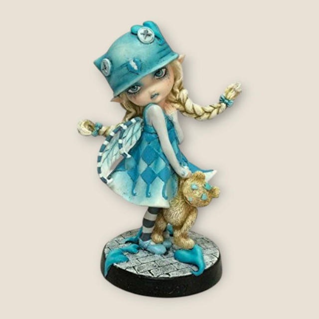 Fée gothique bleue avec poupée