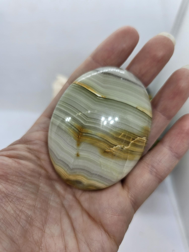 Green banded calcite palmstone 