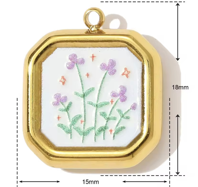 Charm sfaccettato fiorellini lilla 