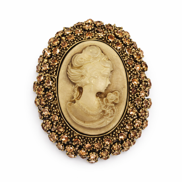 Broche camafeo con cristales champagne 