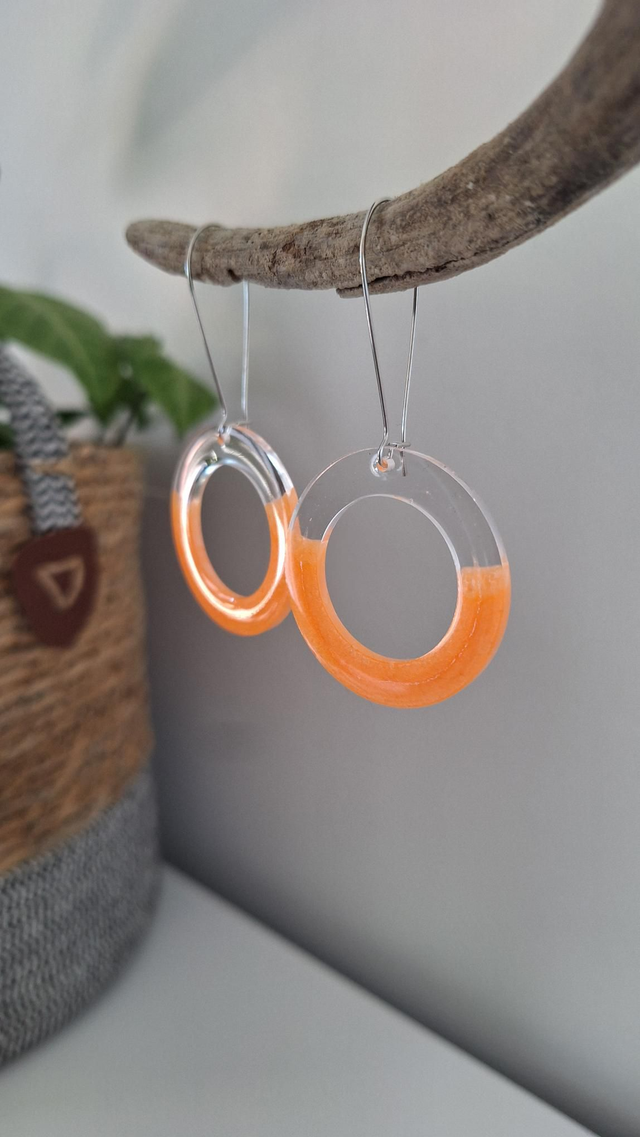 Boucles oreilles fluo orange et transparent 