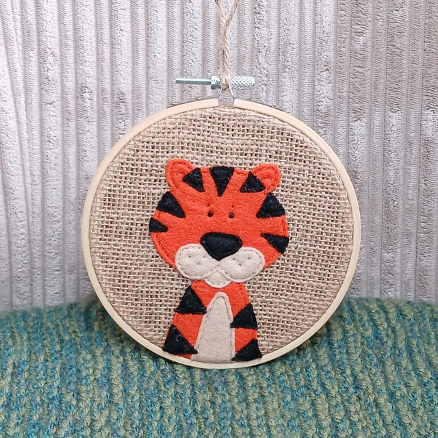 Safari Range, hoop art. Fully hand-sewn wool felt designs on hessian. Tiger design. 