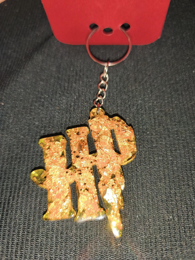 Porte-clé HP feuilles d'or