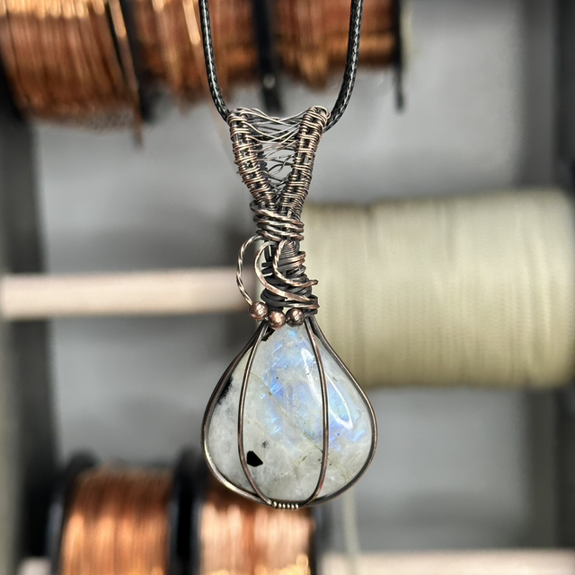 Rainbow moonstone wrapped in pure copper pendant 