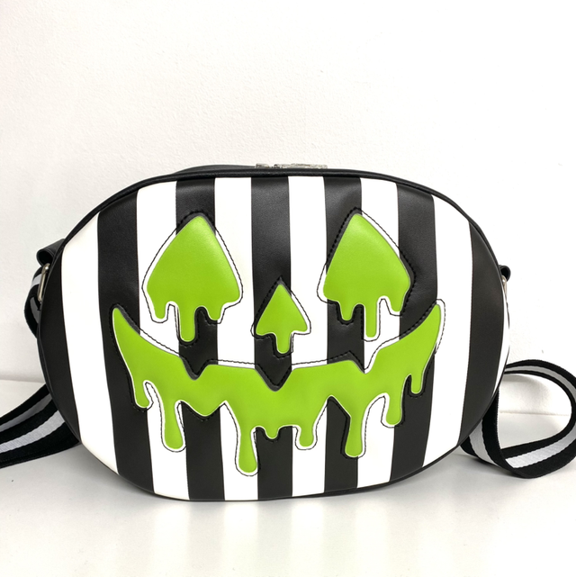 Striped oval shaped crossbody bag 