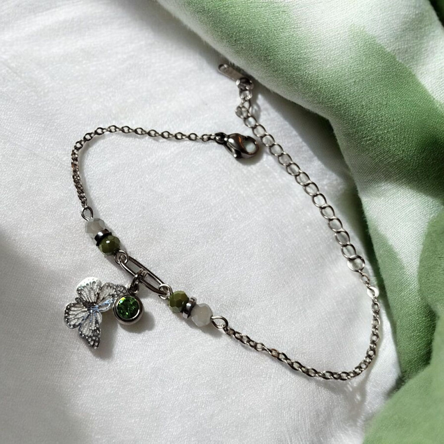 Bracelet acier inoxydable et strass vert et argenté