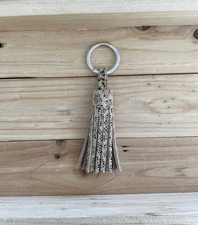 Pompon marron clair à motifs doublé