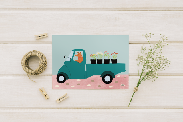 Un renard dans un camion de fleuriste