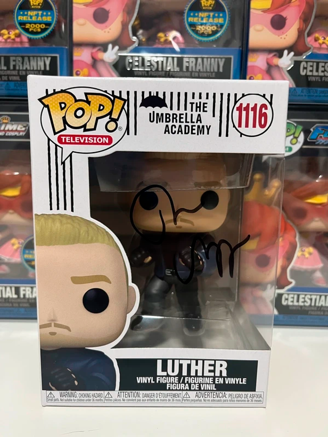 Funko Pop Luther 1116 firmado Tom Hopper