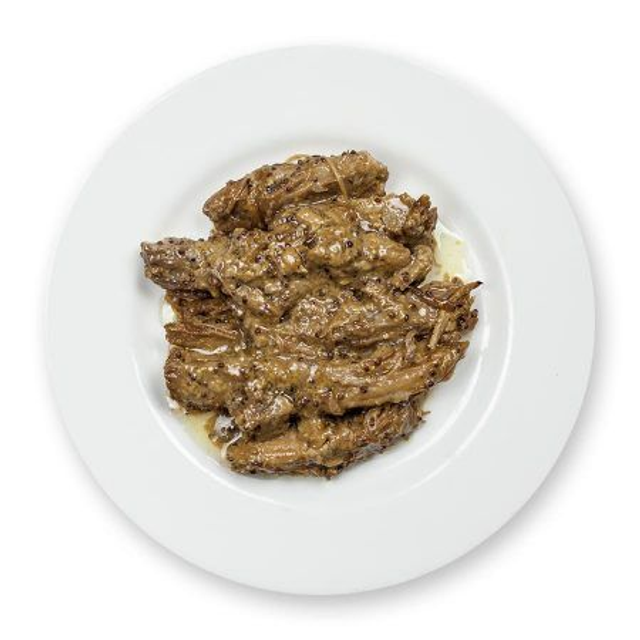 Secreto ibérico asado a baja temperatura a la miel y mostaza antigua