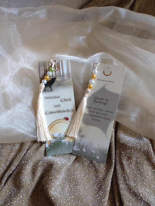 Schmucklesezeichen "Zwischen Glück und Gänseblümchen"