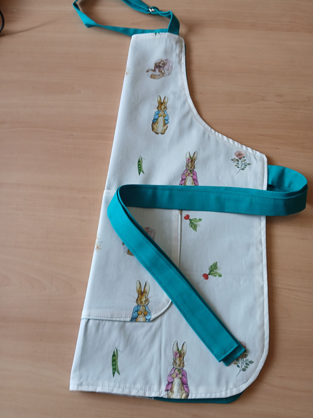 Child's Character Animal Print Apron: Fully lined with pocket.