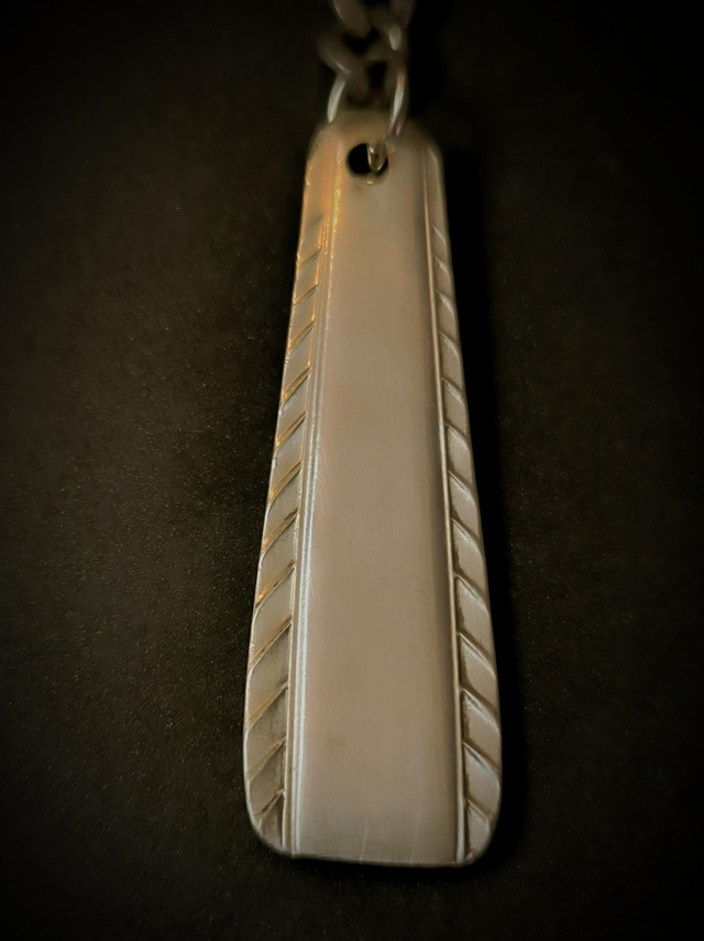 Porte-clé en métal argenté