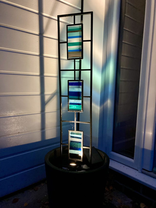 Blue horizons garden trellis with fused glass panels