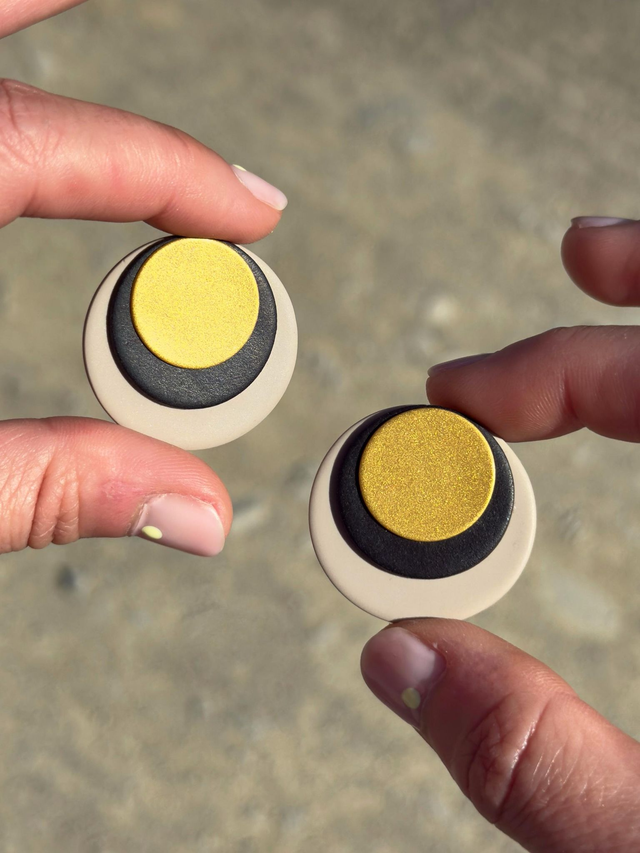 Eclipse greige, negro y dorado