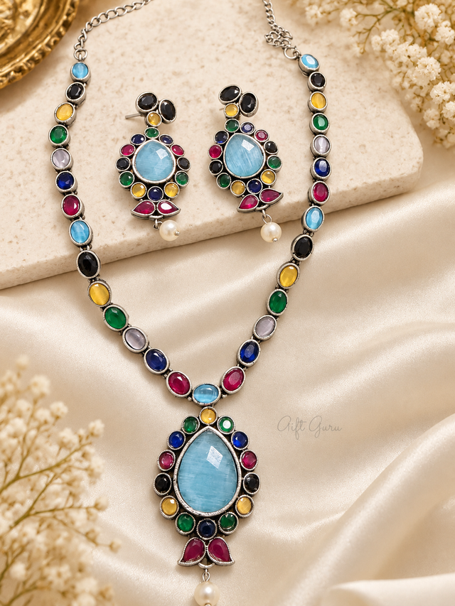 Multicolour Oxidised Silver Necklace Set with Light Blue Stones and Pearl Drops