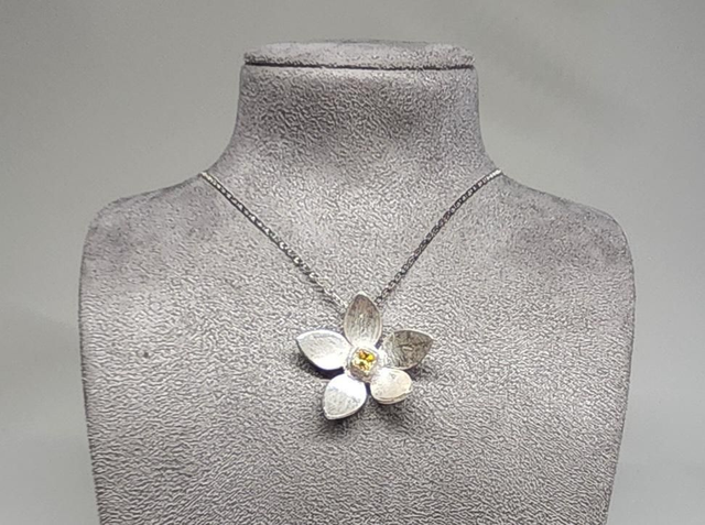Flower with a square cubic zirconia fine silver pendant