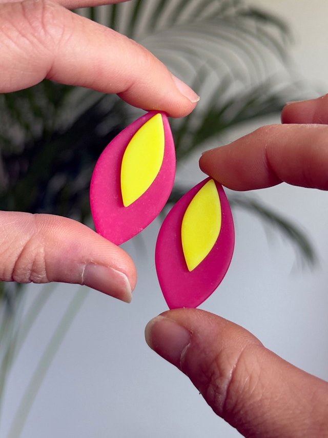 Candela fucsia y amarillo neón