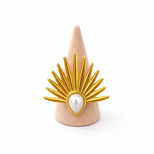 Anillo acero dorado y perla 