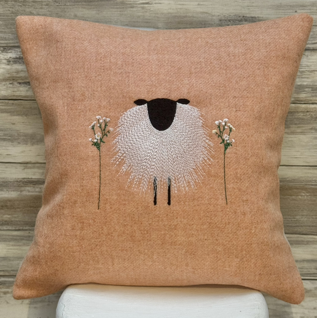 Peach lambswool embroidered sheep cushion 