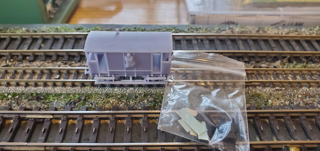 30 ton brake van unpainted. Supplied with steel wheels , flying snail and cie decals and Dapol nem pockets. 