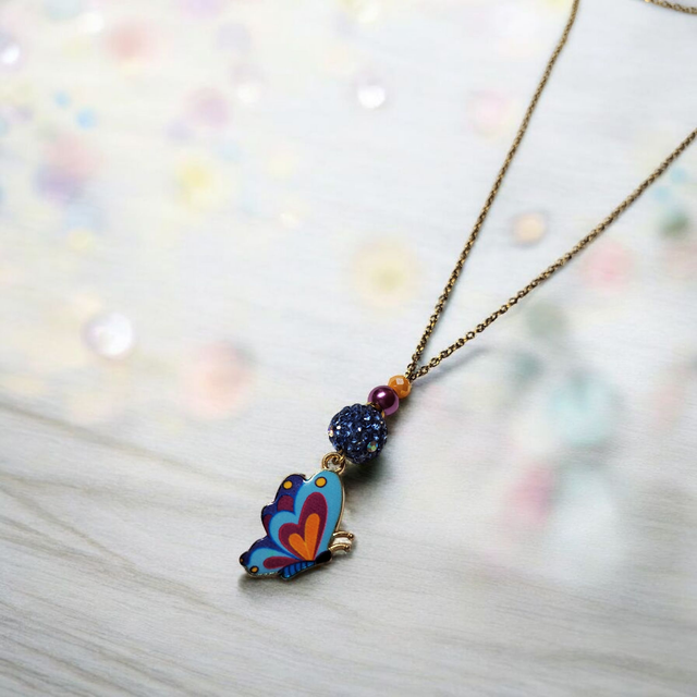 Collier acier inoxydable et cristal bleu papillon